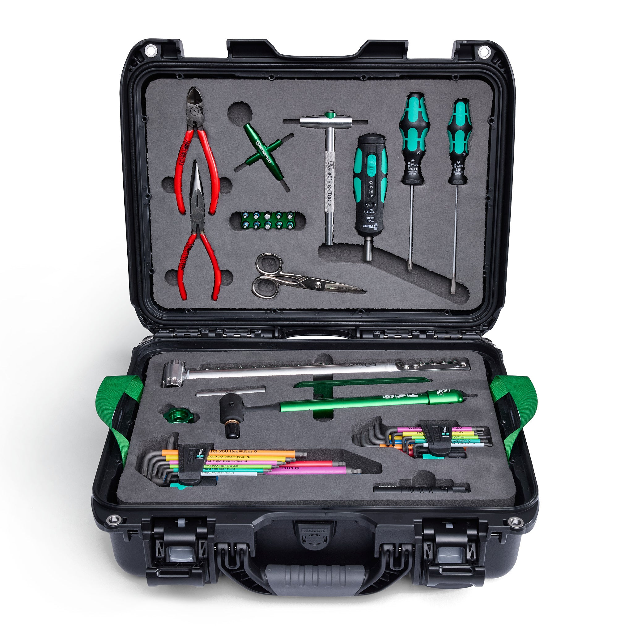Tool kit with various tools in an open black case on a white background